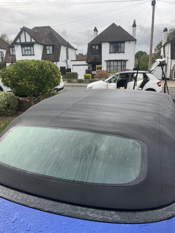 Fabric cleaner foaming on a convertible soft top